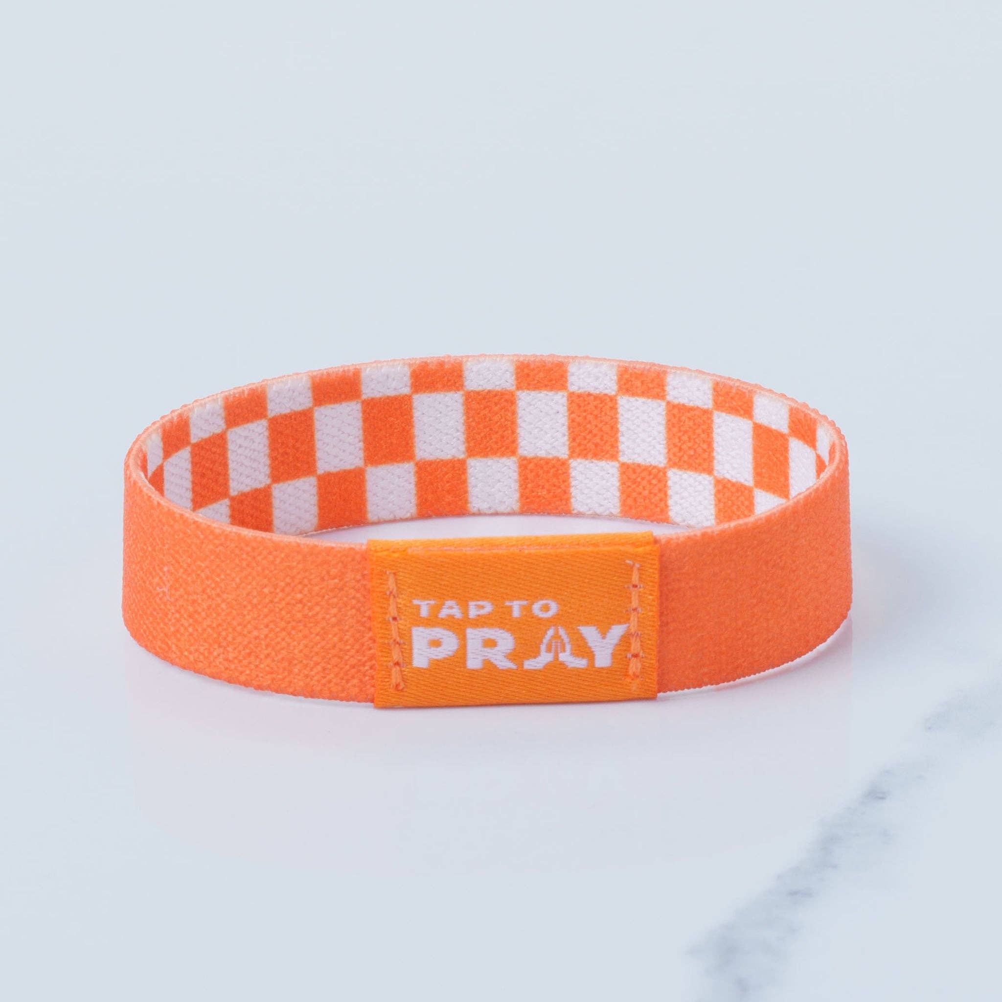 Tap To Pray® Wristband – Orange & White Checkers