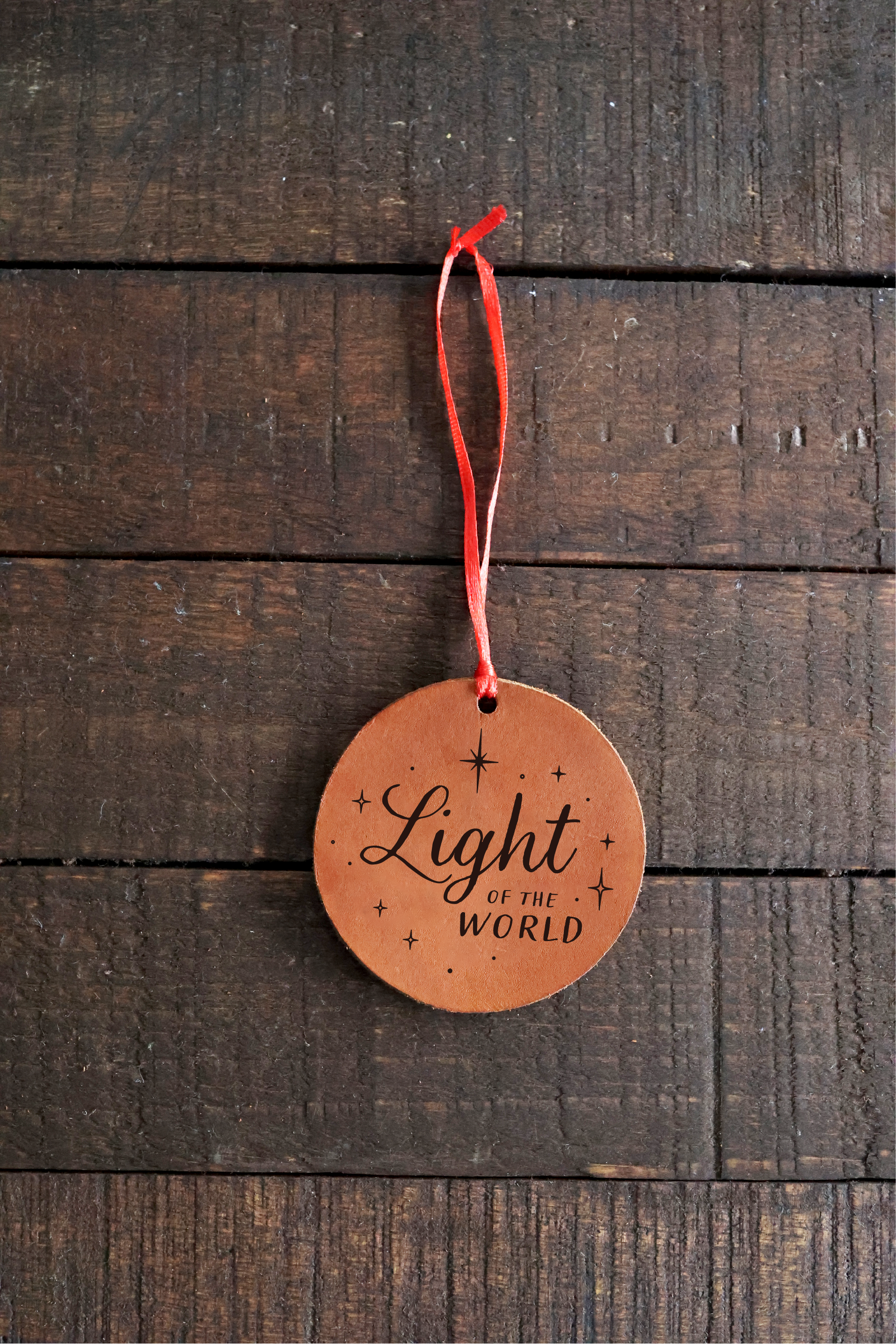 Star "Light of the World" Leather Ornament