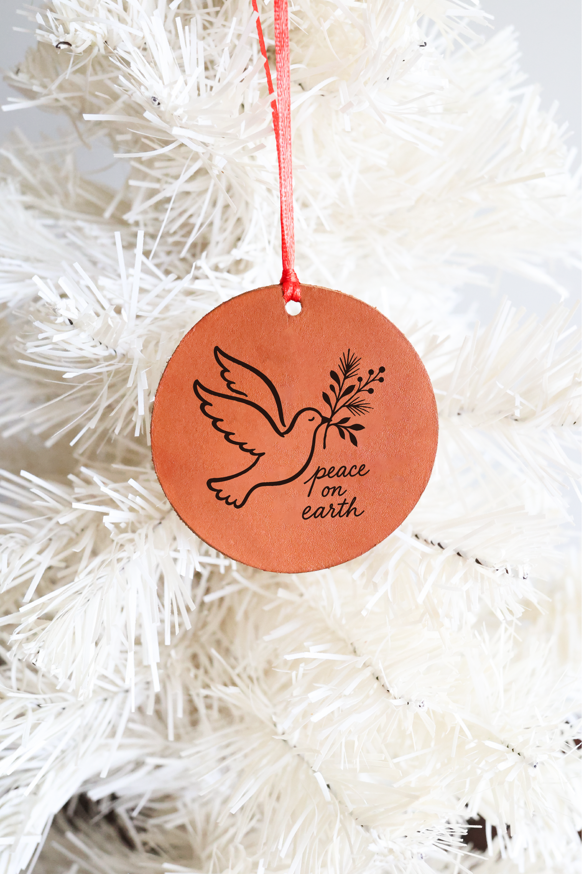 Dove "Peace on Earth" Leather Ornament